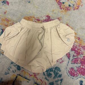 Tan flowy athletic shorts